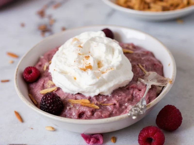Dairy-free coconut whipped topping on berry dessert