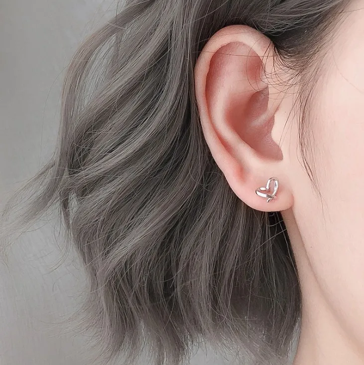 

925 silver Fashion hot sale fashion and sweet hollow heart shape stud earrings women, Silver color