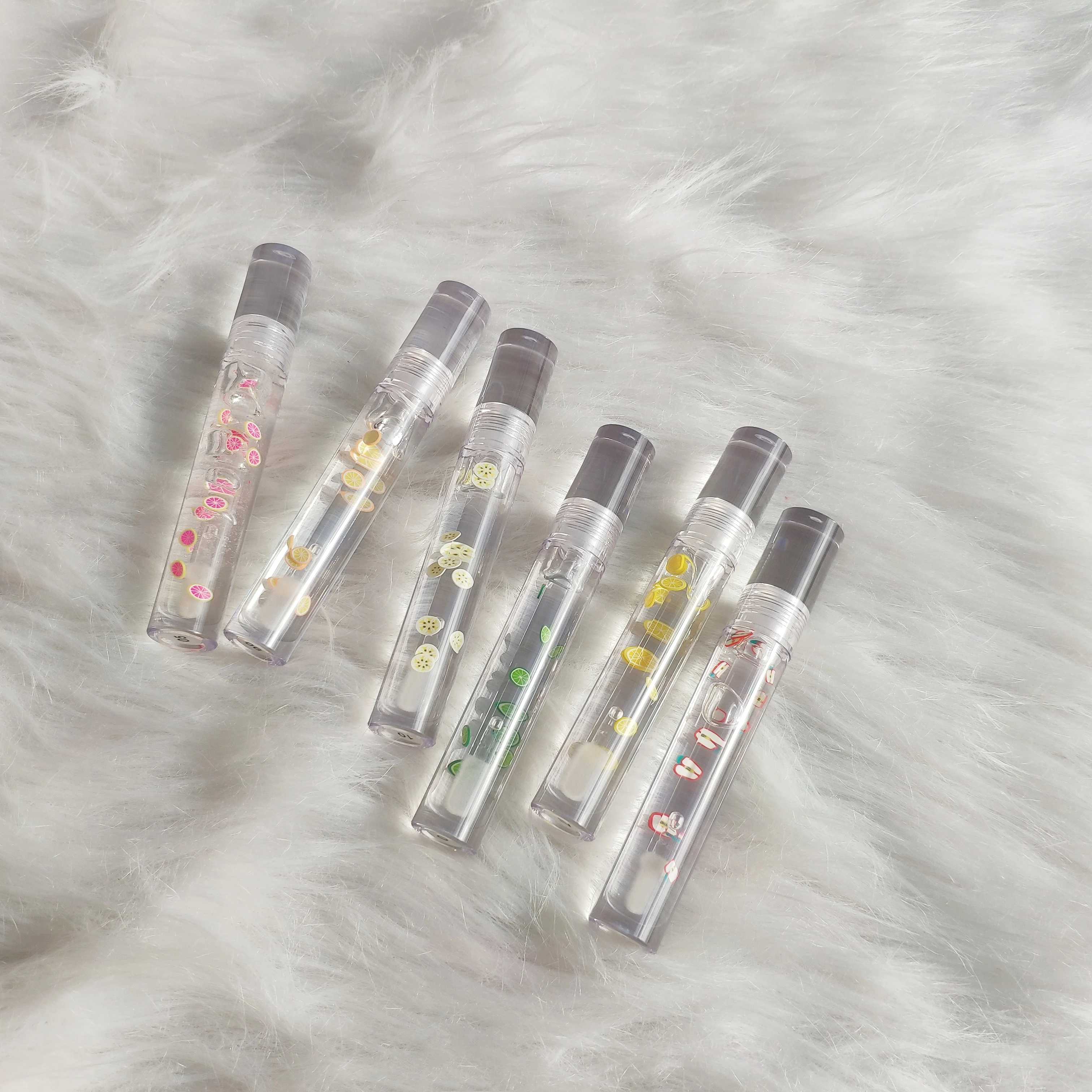 

Wholesale Transparent Color Fruit Cruelty Free Hydrating Ingredients Moisturizing Plumper Supper Glossy Lip Gloss
