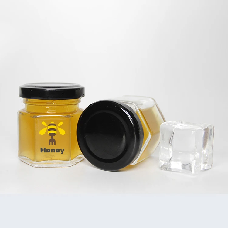 

Wholesale home use 45ml hexagon mini honey jar glass storage jar with gold twist off, Clear