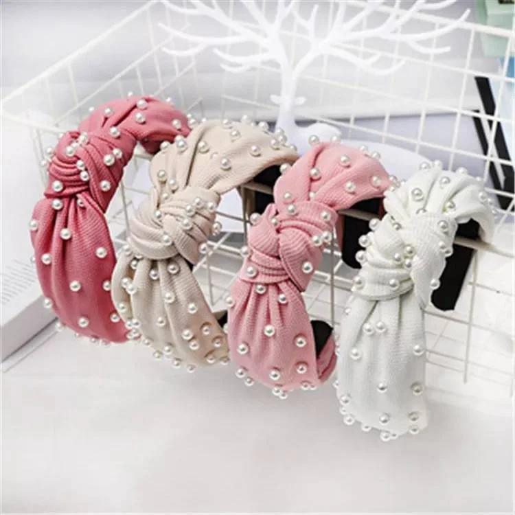 

Wholesale new Pearl knotted hair hoop solid color headband sweet cloth art head buckle