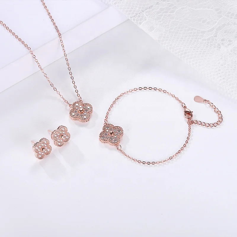 

The latest selling fashion brass four-leaf clover bracelet necklace earrings set