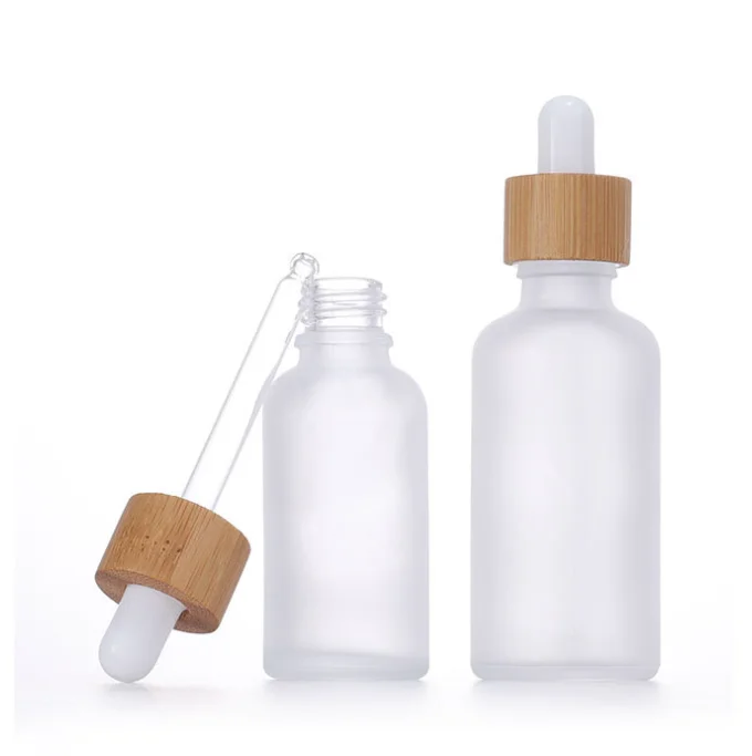 

5ml 10ml 15ml 20ml 30ml 50ml 100ml Frosted Clear Essential Oil Glass Dropper Bottle With Bamboo Dropper Cap