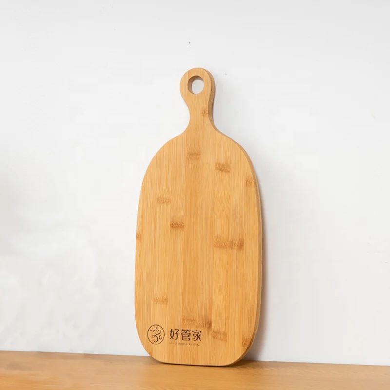 

Homemade original pizza chopping board Irregular type Bamboo cutting board with handle, Natural bamboo color