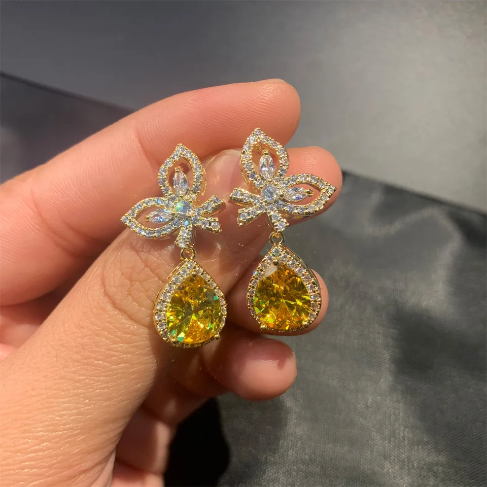 

Shangjie OEM joyas Fashion Dainty Korean Earrings Unique Silver Needle WaterDrop Earrings Zircon Butterfly Earrings for Women