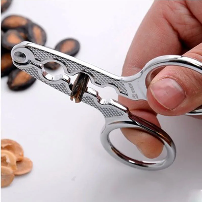 

Home Stainless Steel Peeling Pliers Seed Cracker Black Melon Seeds Pistachio Seeds Pine Nuts Sheller Kitchen Tool, Silver