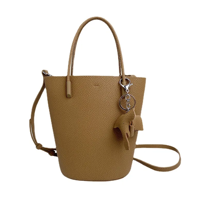 

Designer New Product For Fall/Winter 2021 Korean Simple Baby Elephant Pendant Handbag Messenger Genuine Leather Bucket Handbags, Blue ,black,grey,brown,khaki