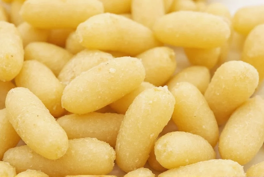 Close-up of ginger gum pieces showing natural beige color and texture