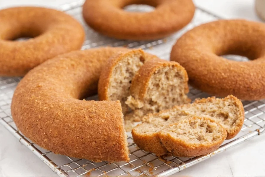 Close-up of freshly baked cinnamon donut bread with visible cinnamon swirls and golden crust