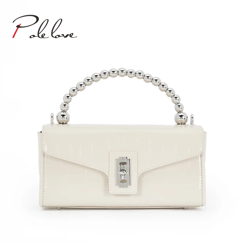 

luxury 2021 designer personality creative fashion messenger bag white steel balls handle