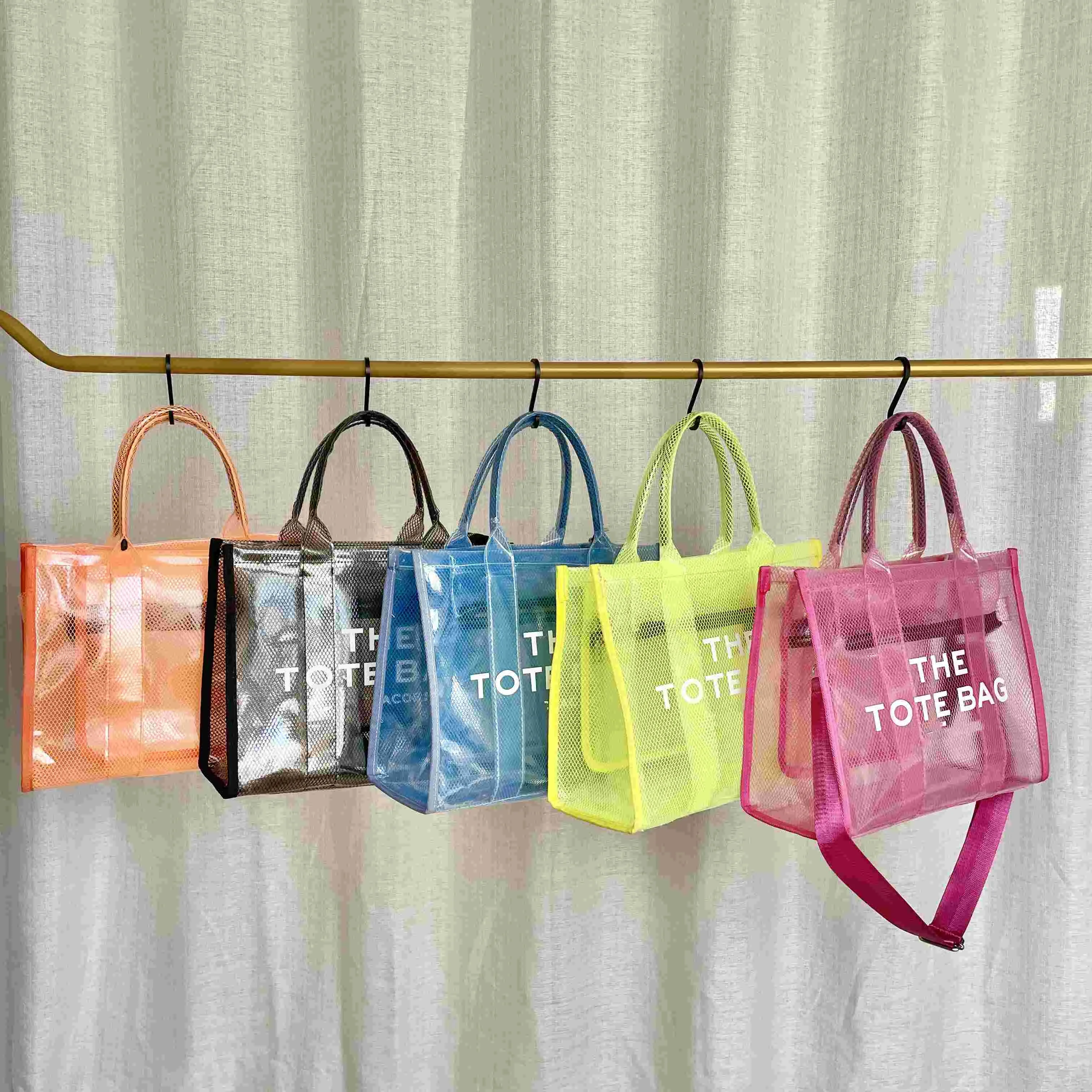 

2022 New Trending Summer Translucent Transparent Clear PVC Women's Tote Bags Custom Purses and Handbags Women Hand Bags Ladies