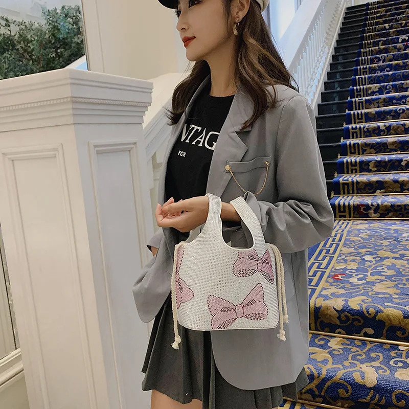 

The latest design of the bucket of rhinestones decorated the bag stylish and casual women's handbag boxycharm glam bag wholesale, White black pink