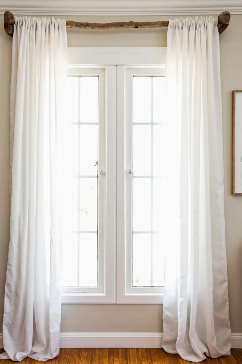 West Elm driftwood curtain rod in natural finish