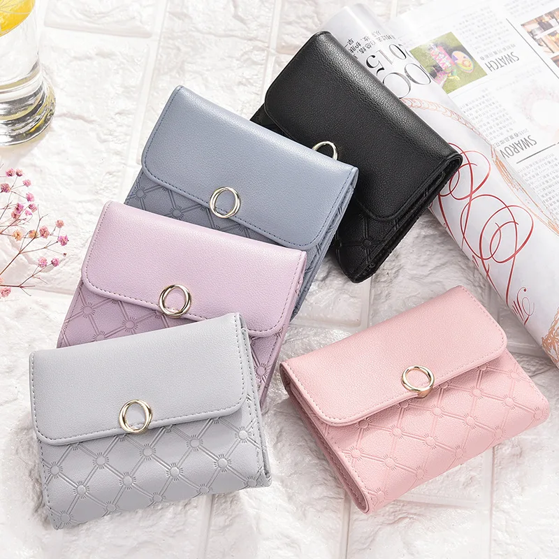 

Small coin purse female short new Japan and South Korea hundred buckle soft leather folder fashion mini three fold card bag