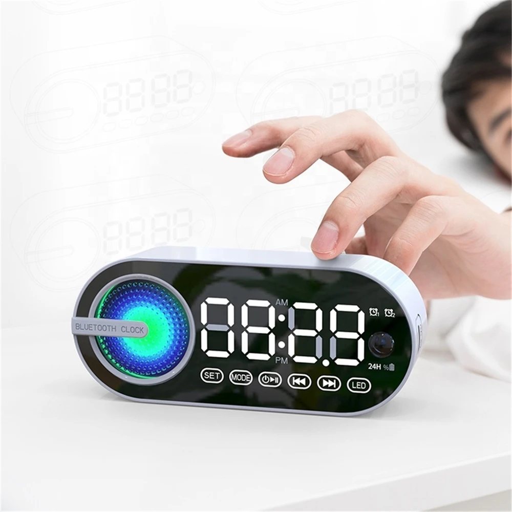 

Hot Selling Wireless Mini Portable Home Speaker Alarm Clock With FM Radio Led Surround Light Loudspeakers Blue tooth Speakers