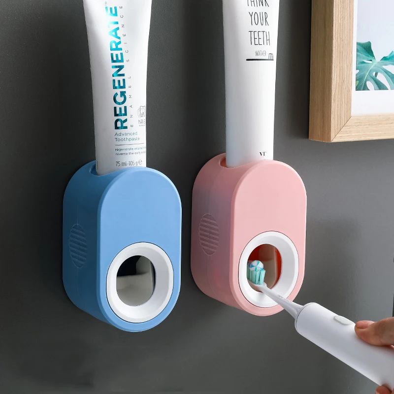 

Hot selling automatic toothpaste squeezing device strong and seamless sticking toothpaste device squeeze artifact