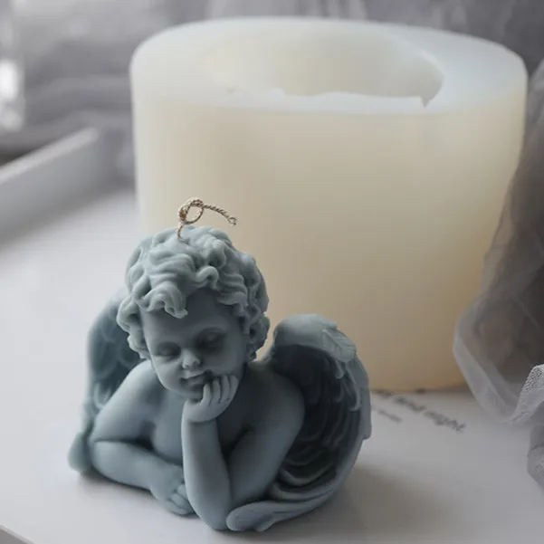 

Little angel holding chin with one hand Silicone Candle Mold, Pink