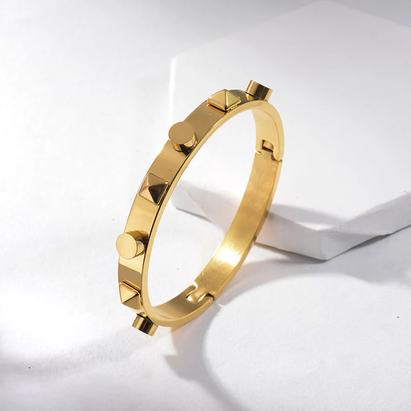 

Baoyan Punk Gold Plated Cone Rivets Shape Bangles Brand Stainless Steel Jewelry