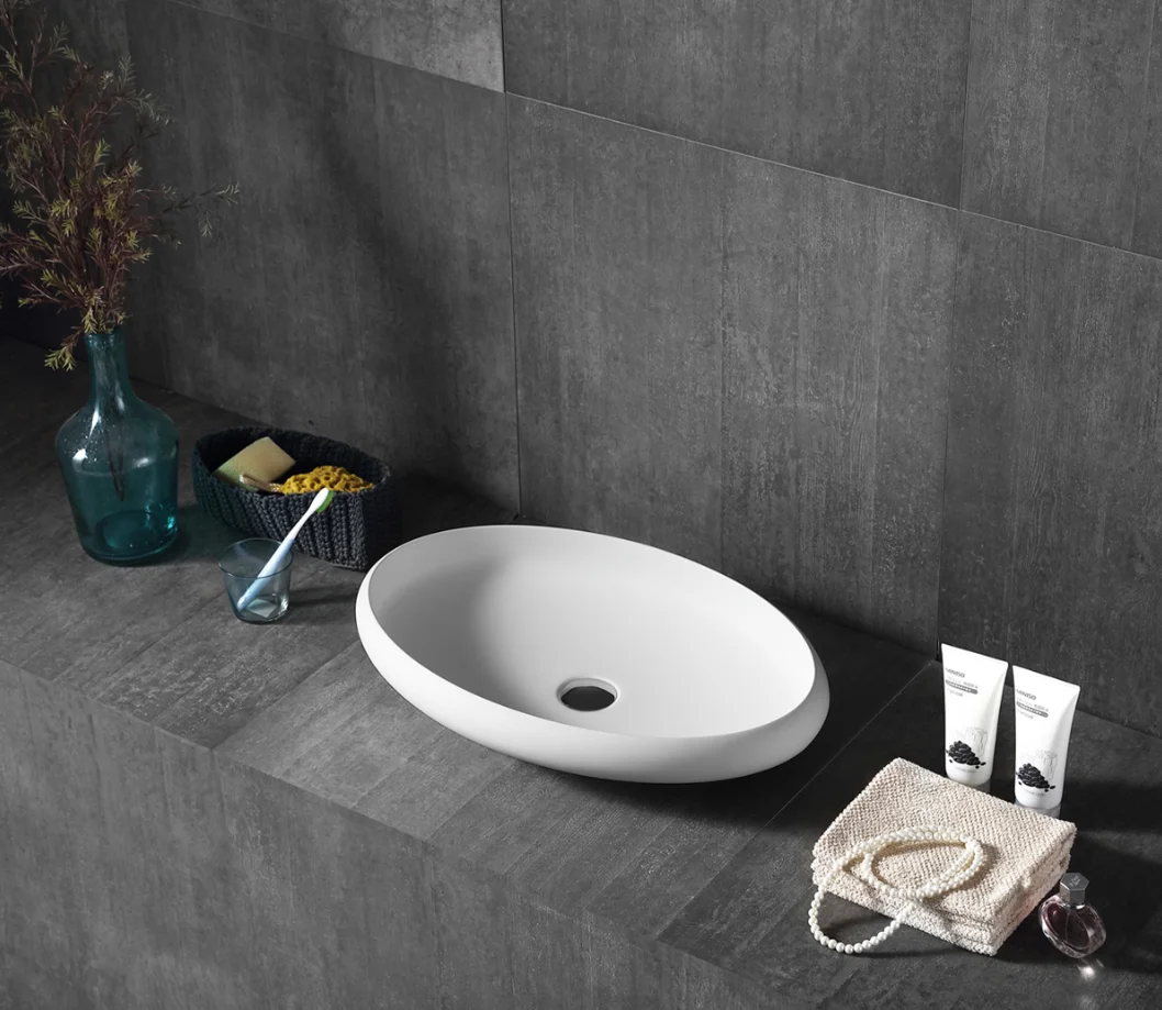 Solid surface elegant oval wash basin artifical stone white