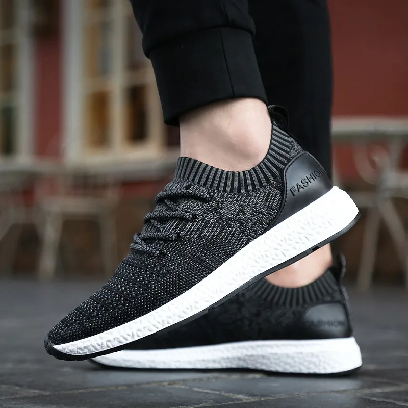 

Cheap wholesale knitted breathable vamp Sports casual shoes for men