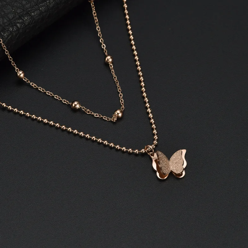 

Aug jewelry Double-layer trendy titanium steel necklace women round bead pressed sand butterfly pendant stainless steel necklace