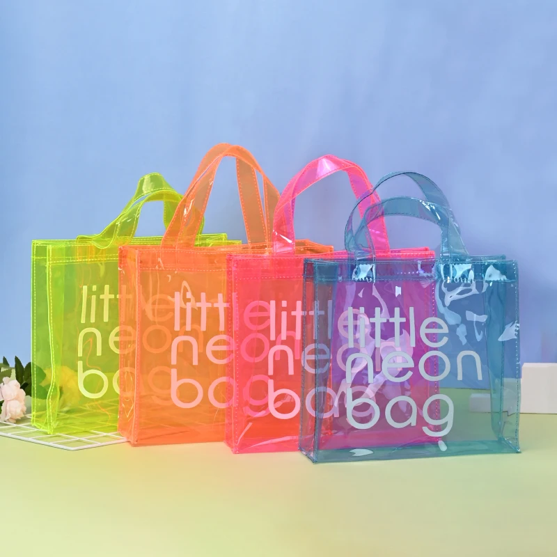 

Wholesale Large Shoulder Tote Bag Trend Women Shopping Beach Bag Custom Pvc Clear Letter Print Neon Tote Bags