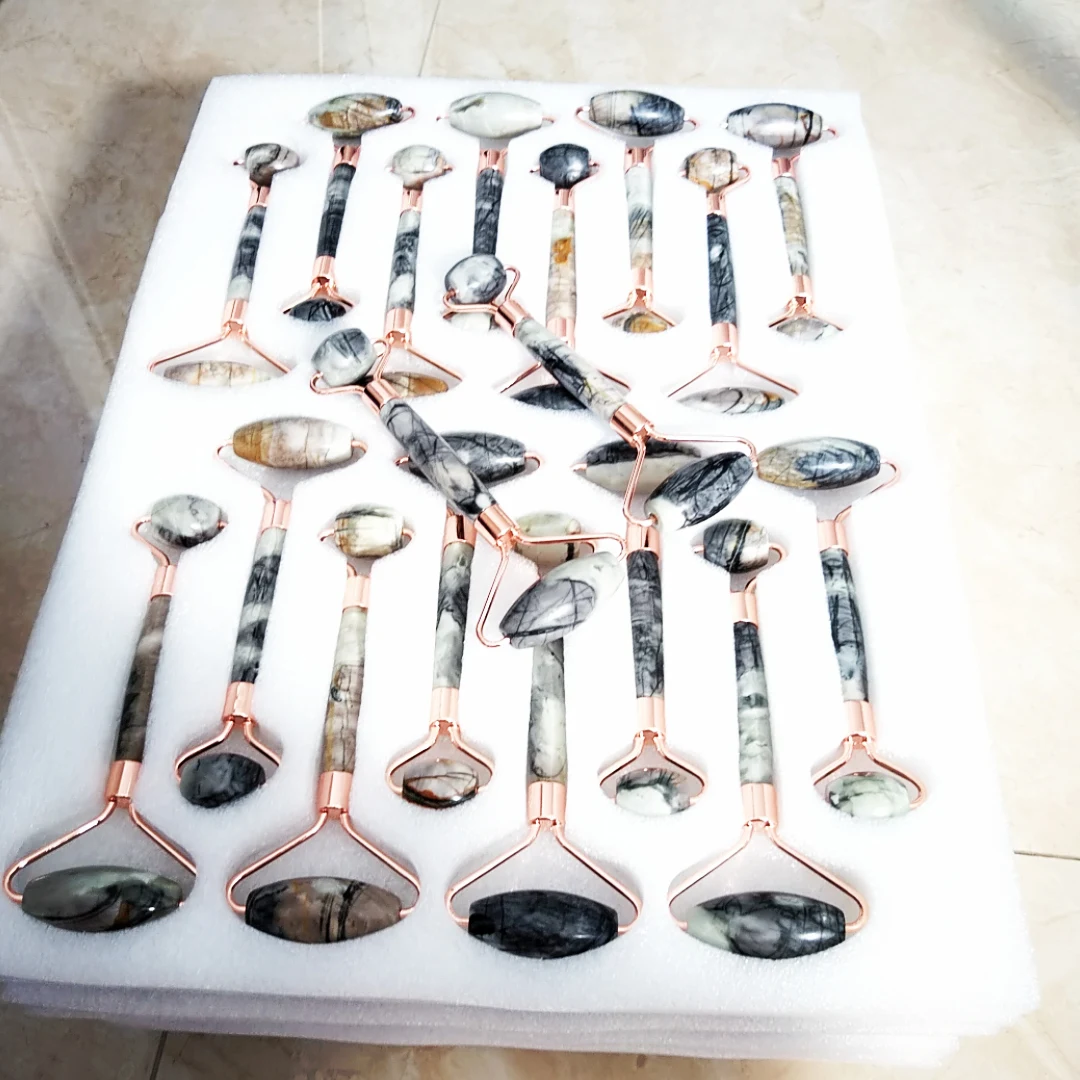 

Quartz facial roller. Picasso jasper Skin massager. Facial roller