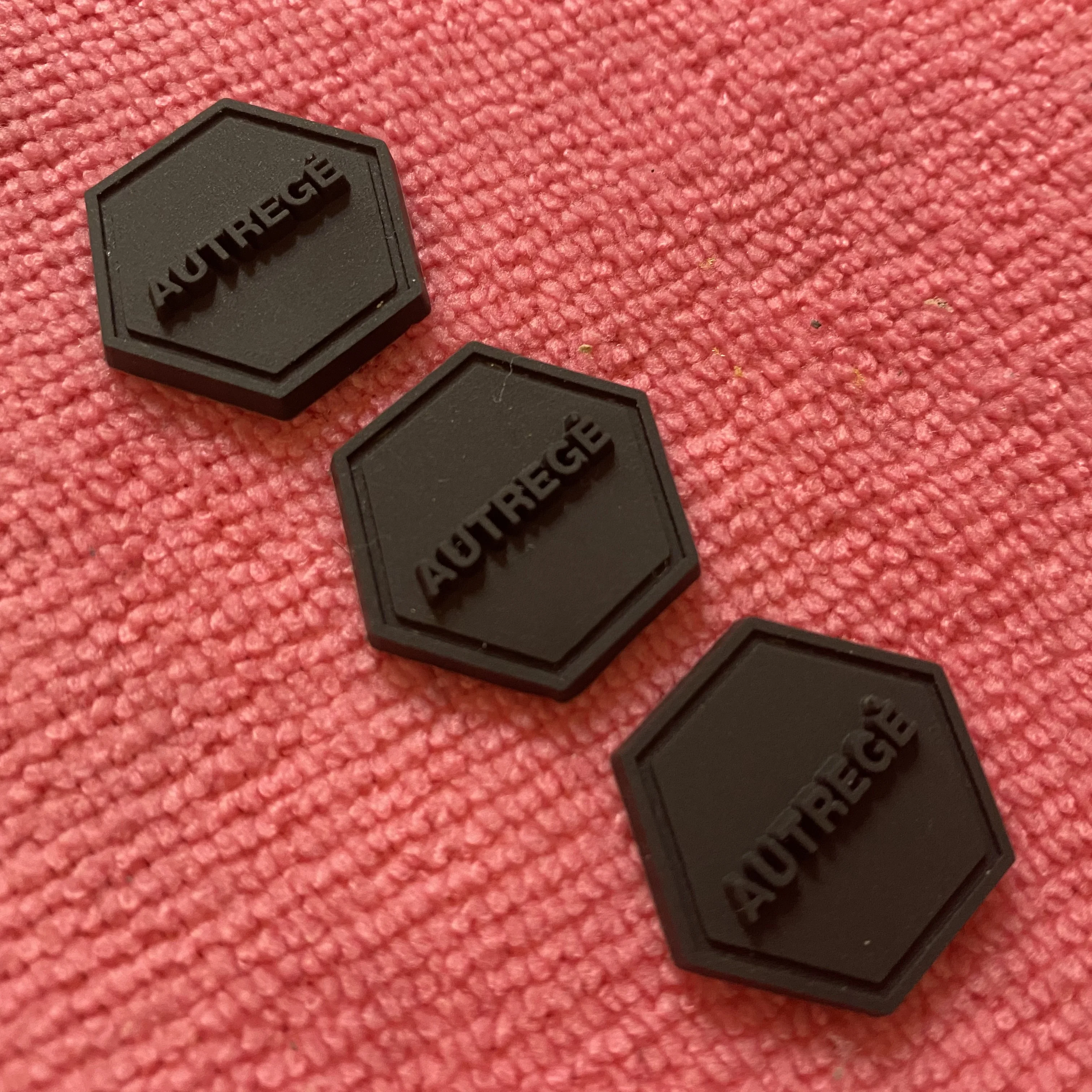 Hexagon Shape 3D Raised logo PVC Rubber Label2.5mm Thickness Rubber Clothing Tag With Sewing Channel