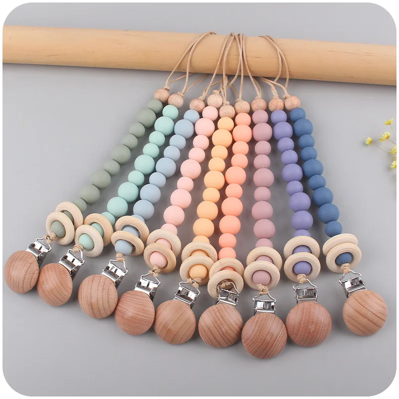 

Baby Silicone Pacifier Chain Silicone Teething Beads Baby Leather Chain Wooden Dummy Clip Holder