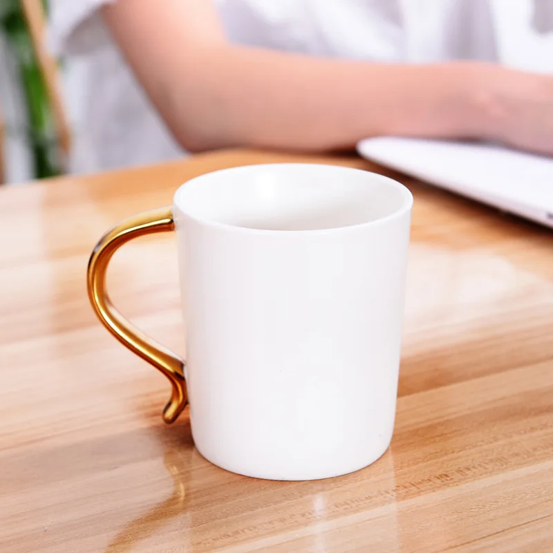 

Elegant design golden handle ceramic coffee mug customized, White,black