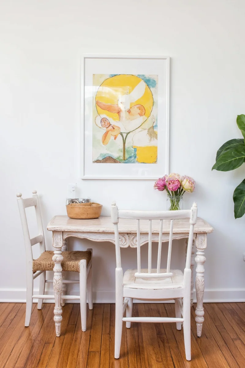 Kid choosing wall sticker with parent