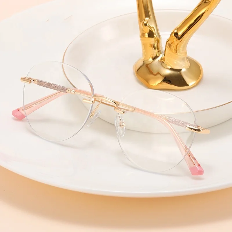 

Jiuling eyewear fashion round frameless cut out edge optical eyeglasses rimless blue light blocking lens glasses frame eyeglass