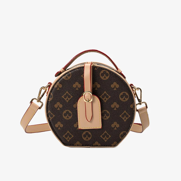 

2020 Amazon new fashion and creative PU Circular cross-body bag knurling high-capacity one-shoulder bag, 2 colors as picture
