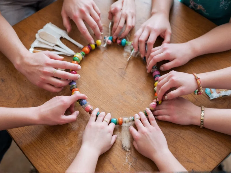 Diverse hands creating together in vibrant craft hub