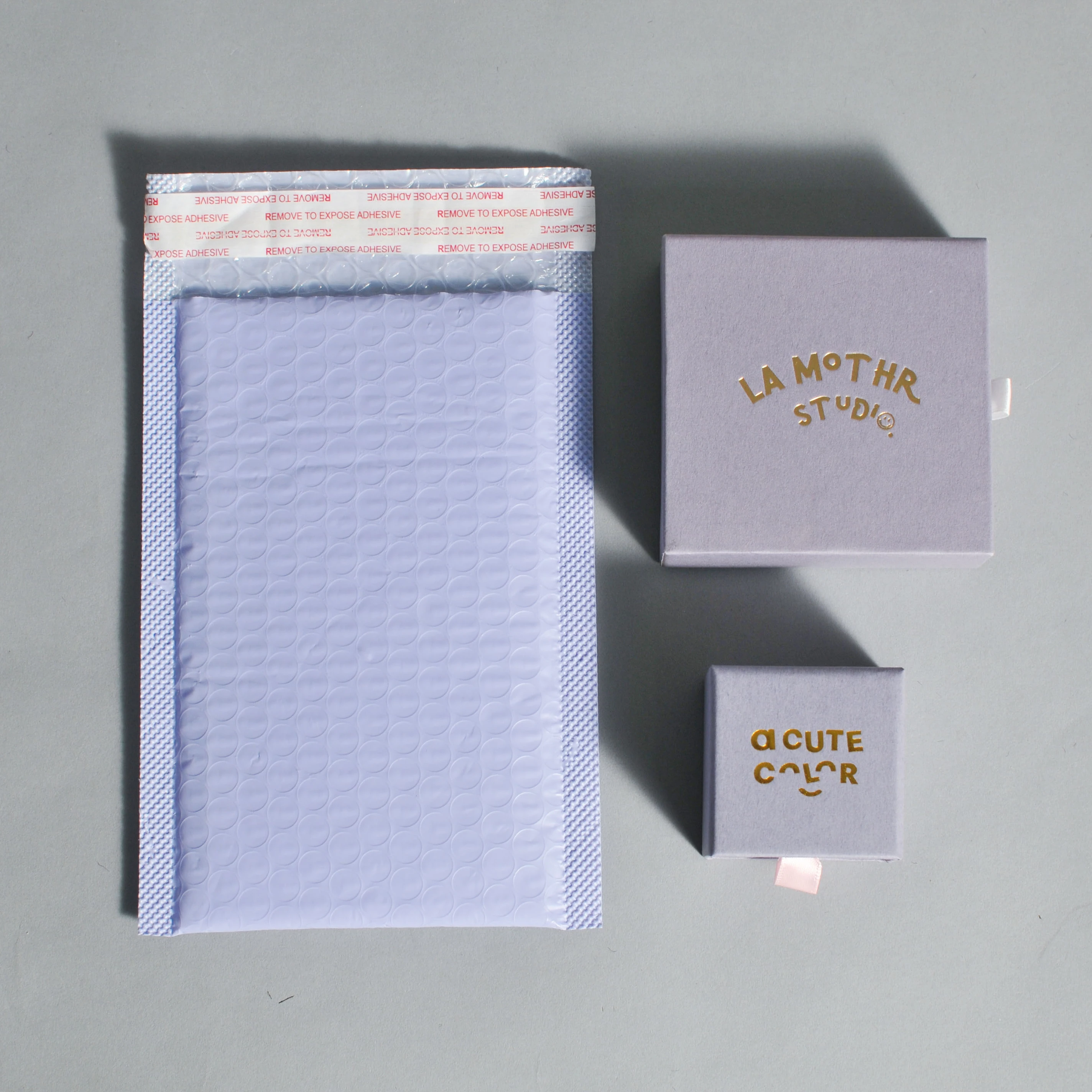

WangFu 2023 Hot Selling Purple Color Jewelry Shipping Packaging Drawer Box Bubble Bag Custom Logo