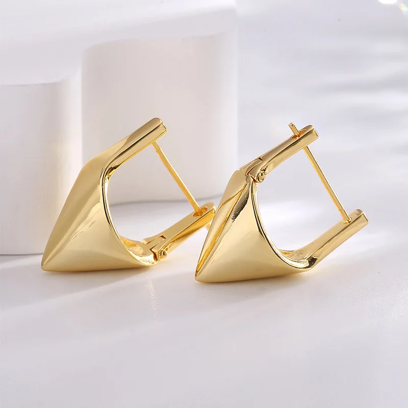 

Simple geometric conical earrings female copper plated real gold fashion everything cool ear hanging earrings