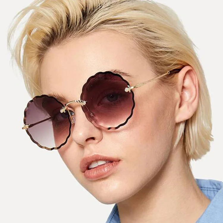 

DCOPTICAL 2021 New Design Unique Round Rimless Flower Petal Wavy Line Side Scrap Women Metal Frame Adult Sunglasses