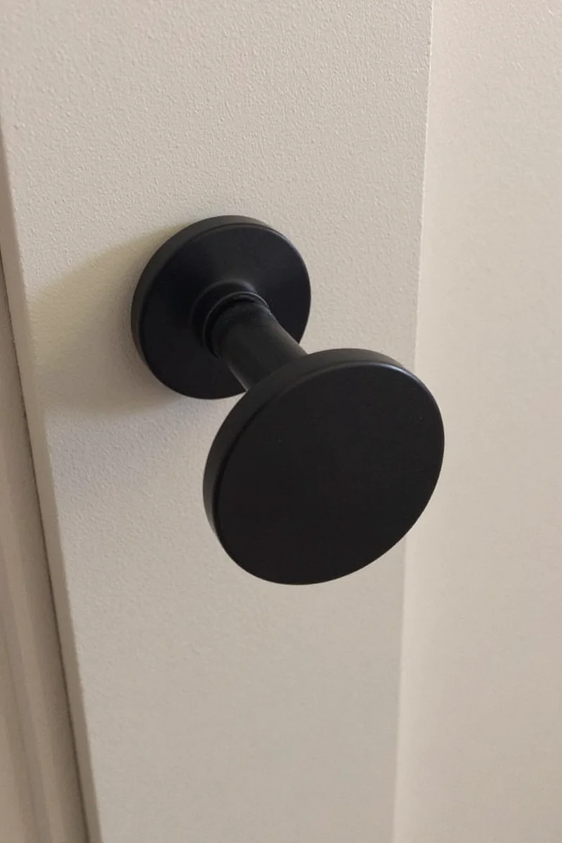 Child-safe black drawer pulls for toddler-friendly kitchens