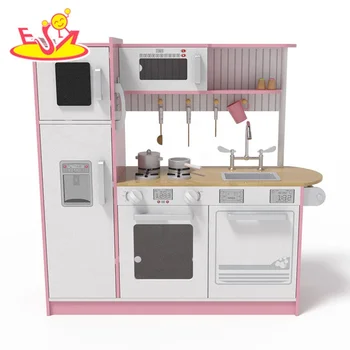 pink wooden toy kitchen