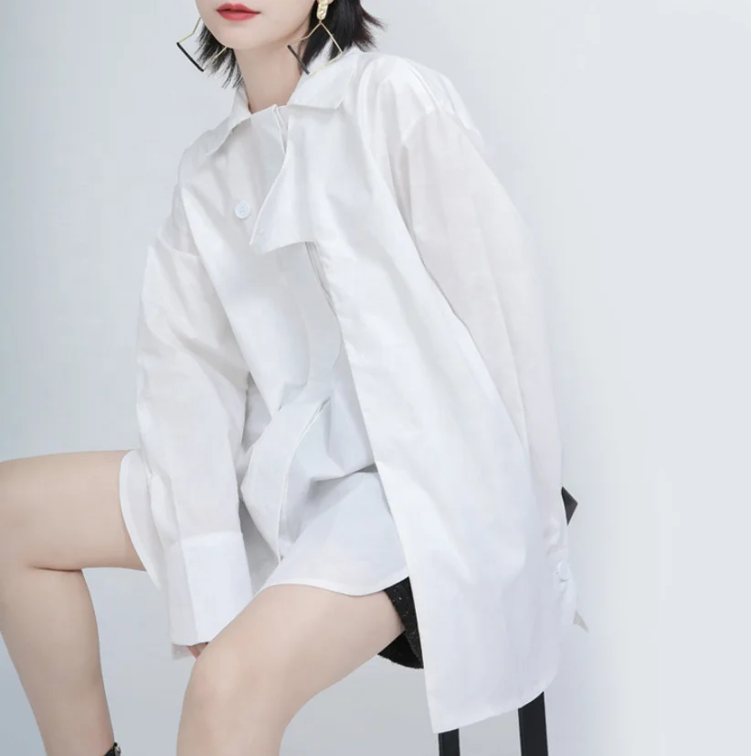 

B15010A Latest lady new fashion irregular blouse shirt