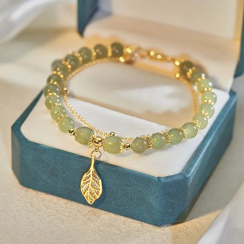 

2023 Golden branch jade leaf bracelet natural Hetian jade bracelet small leaf Zircon Micro Paved Charm Bracelet