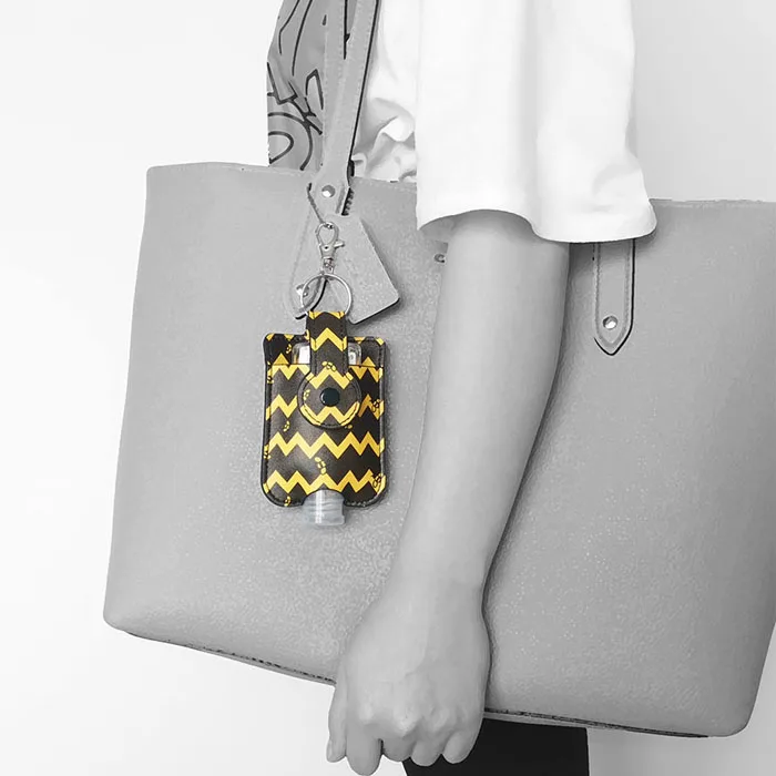 
Big promotion new design leather 50ml hand sanitizer bottle holder keychain from china 