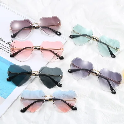 

2020 Wholesale Fashion Children Love shades Sun Glasses Rimless metal Heart shape frameless kids Sunglasses with custom logo, Pink, green, gray...etc