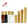 /product-detail/bamboo-cosmetic-packaging-elegant-3ml-5ml-10ml-deodorant-perfume-roll-on-glass-bottle-bamboo-lid-roller-bottle-bj-191c-60813732731.html