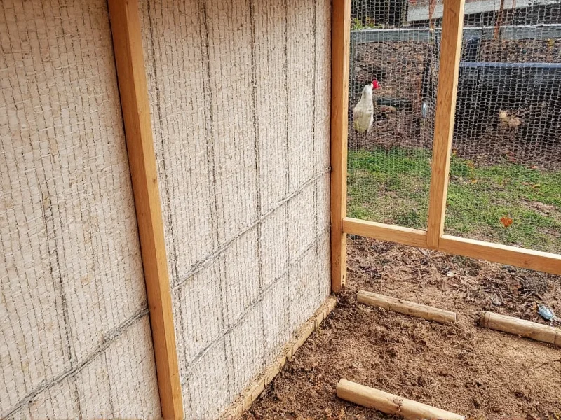 Hardware cloth installation on chicken coop walls