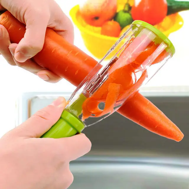 

Kitchen tool stainless steel multi-functional storage peeler with a container fruit vegetable paring knife