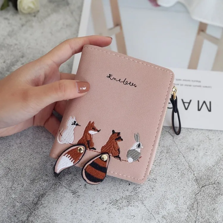 

Custom 2021 new female short student wallet Korean version cute small fresh folding mini trendy personality coin purse keychain