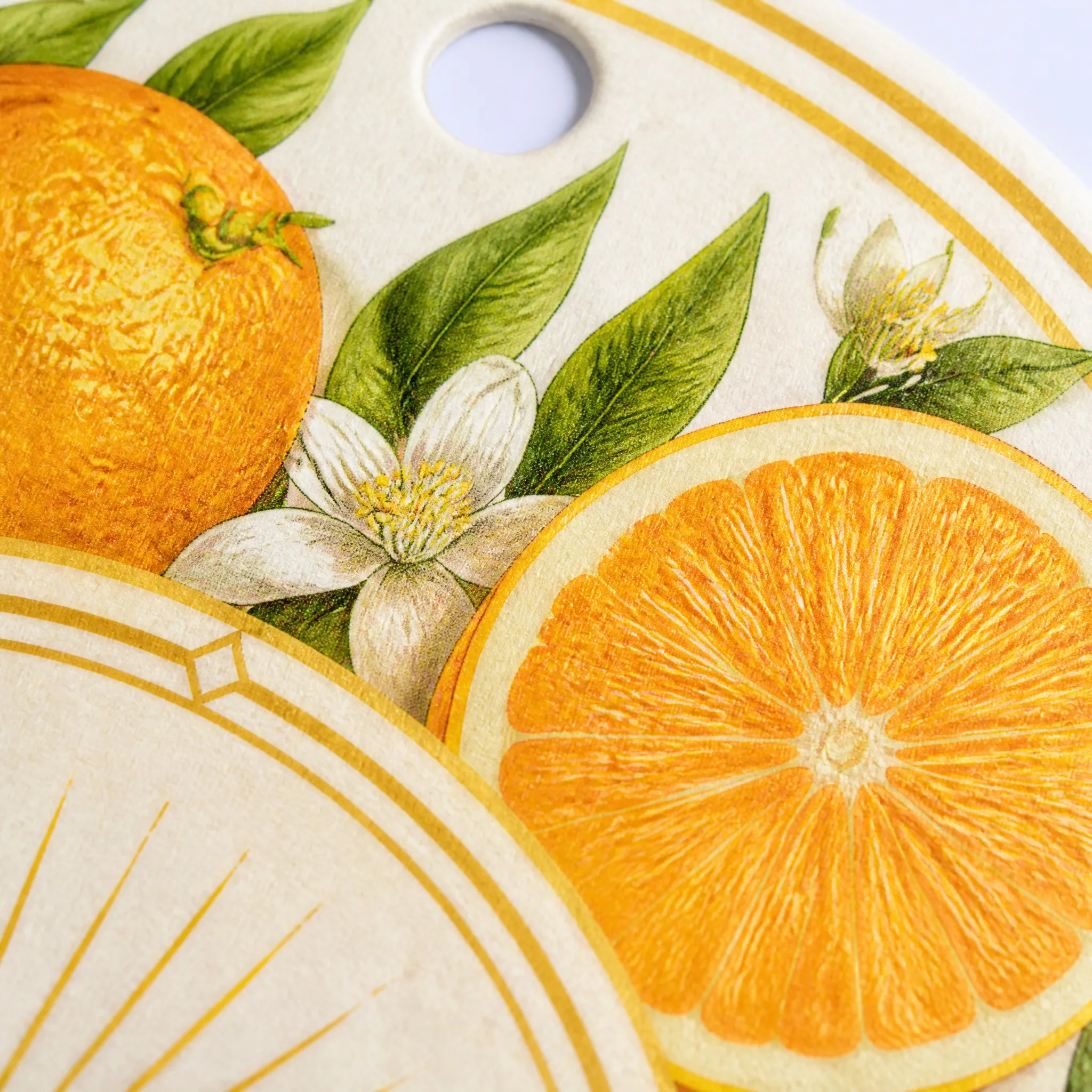 4K Macro Close-up of Sliced Orange Pulp Texture, Blossom, and Gold Line on Air Freshener