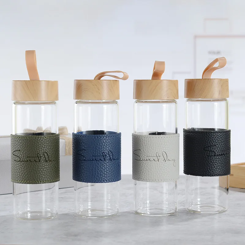 

Feiyou new creative custom 380ml small portable insulated borosilicate reusable filter glass tea infuser bottle with bamboo lid, Customized color