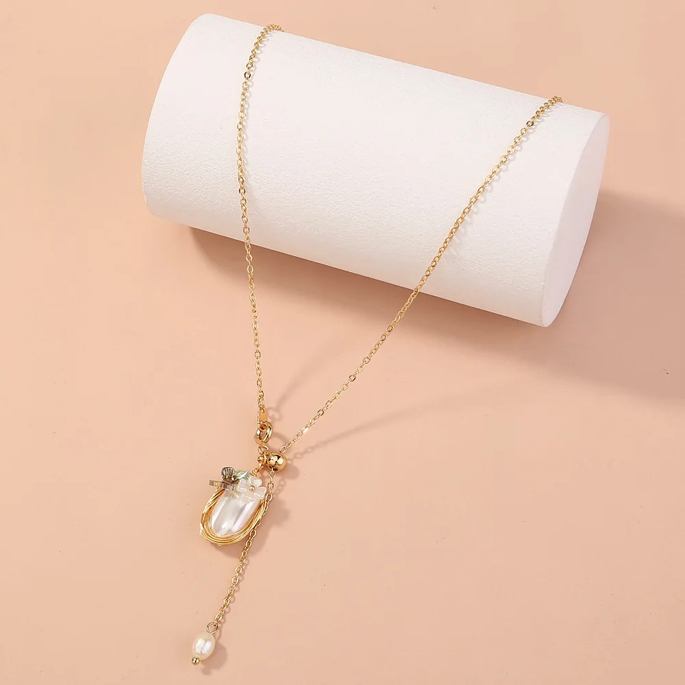 

Factory wholesale Long Pendant Necklace Female Niche Design Handmade Chinese Style Retro Palace Pearl Clavicle Chain Necklace, Picture